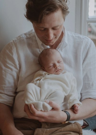 Newborn baby resting peacefully during a natural at-home photography session in London