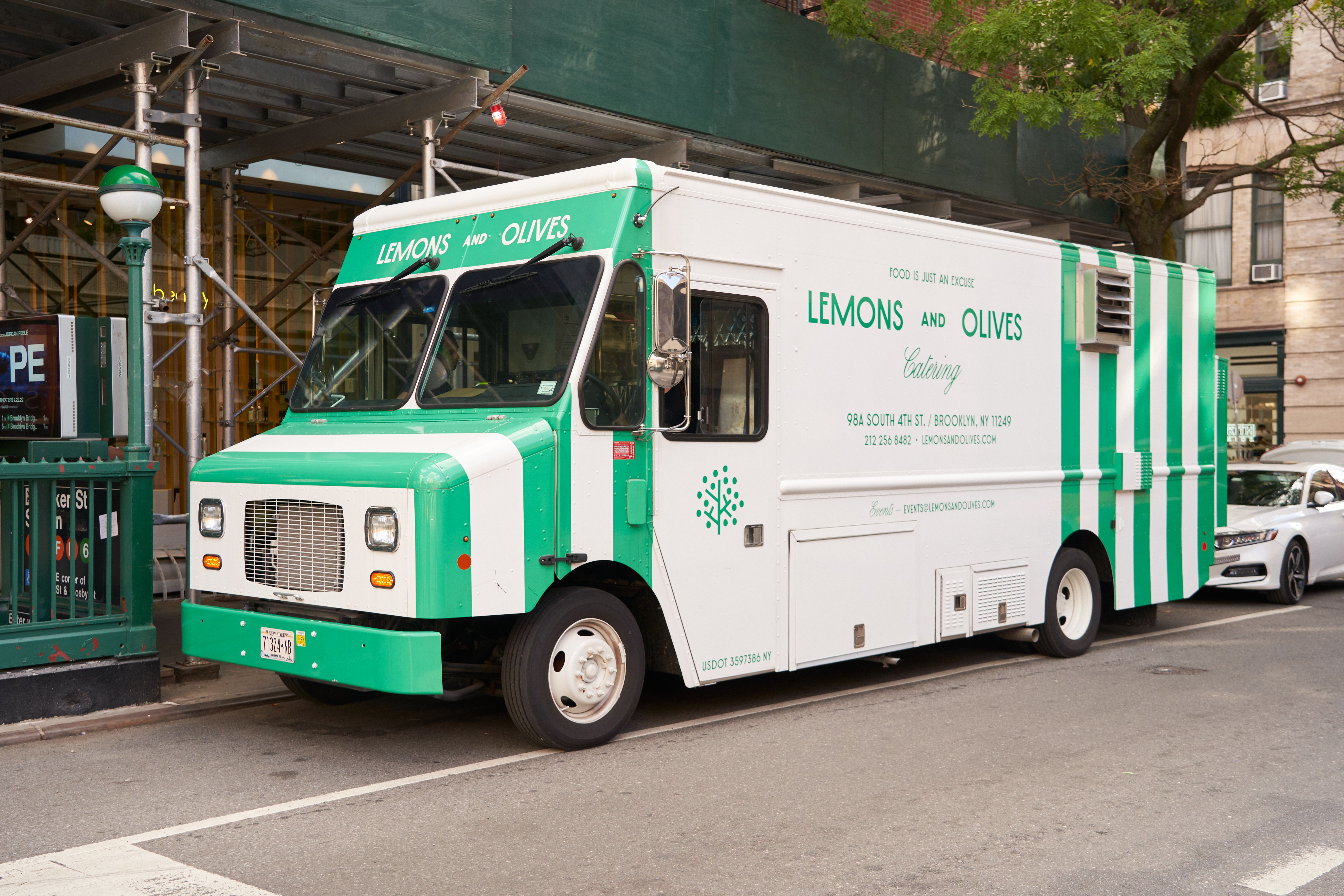 Lemons and Olives catering food truck set up for a brand activation event in Brooklyn.