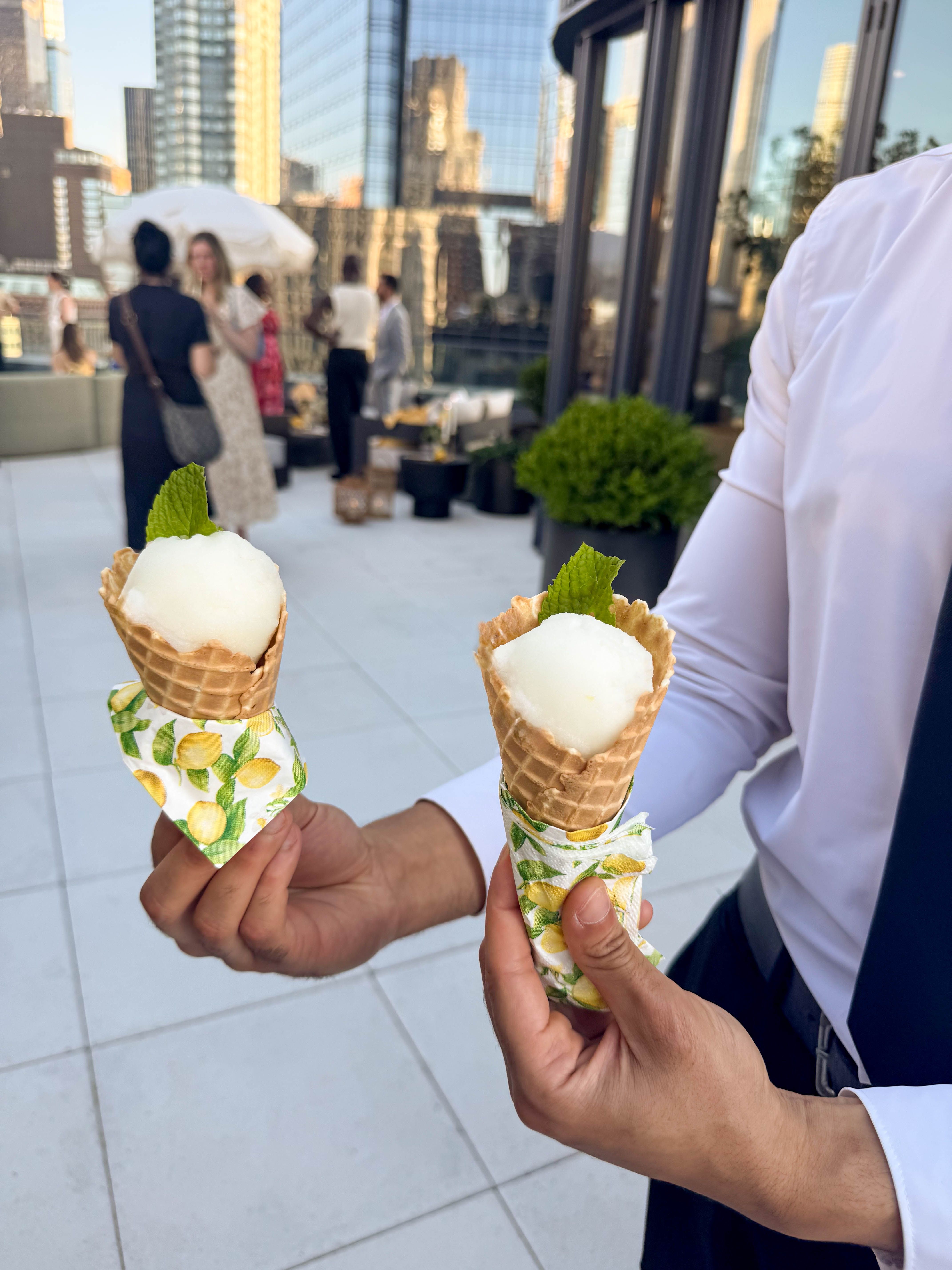 Mini dessert cones served as passed sweets during a rooftop catered event.