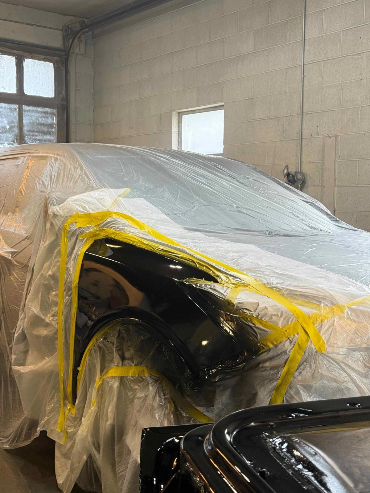 Refinished fender with mirror-like paint after color-matched refinishing