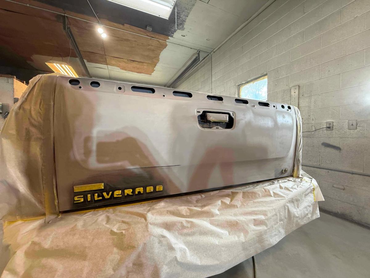 Chevrolet Silverado tailgate in primer ready for color-matched paint application