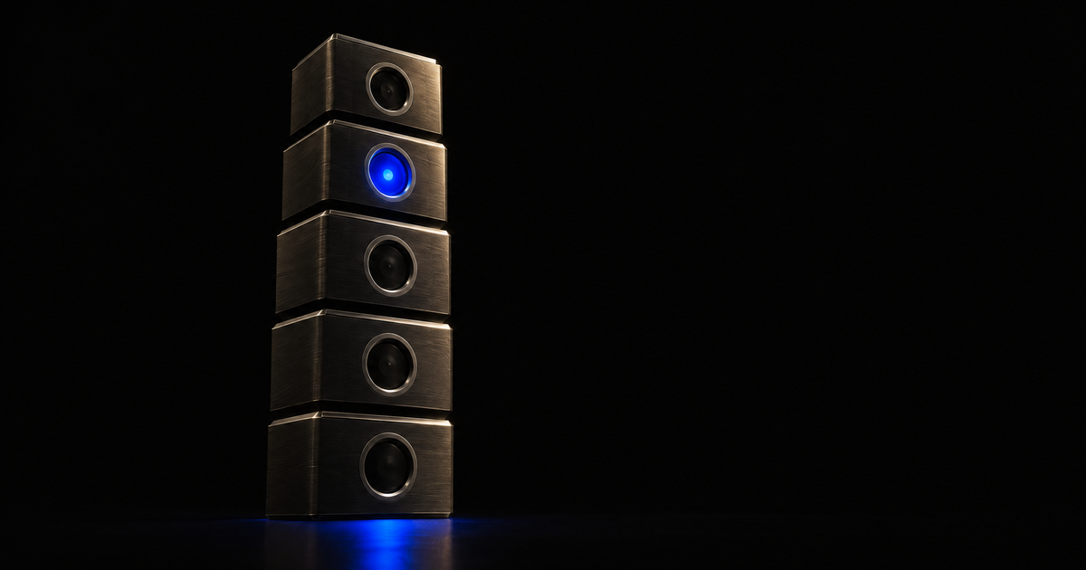 Five stacked machined dark-metal tiers on a black floor, each holding a recessed port, with a single cobalt-blue charge lit at the second tier from the top and spilling onto the floor below.