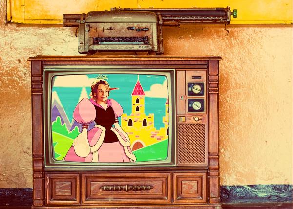 An old TV sits against a concrete wall, featuring an image of Meg Ryan's face on a cartoon princess, in front of a fairy tale castle.