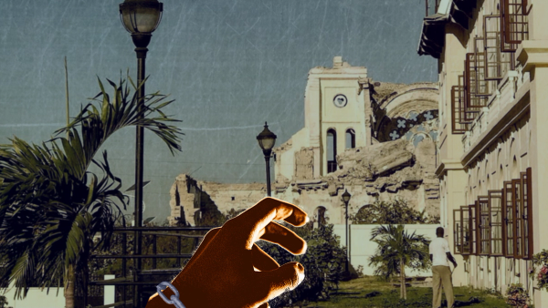 A hand with a chain around its wrist reaches out to a faded picture of an Art Deco era stone building, with palm trees and antique streetlamps.