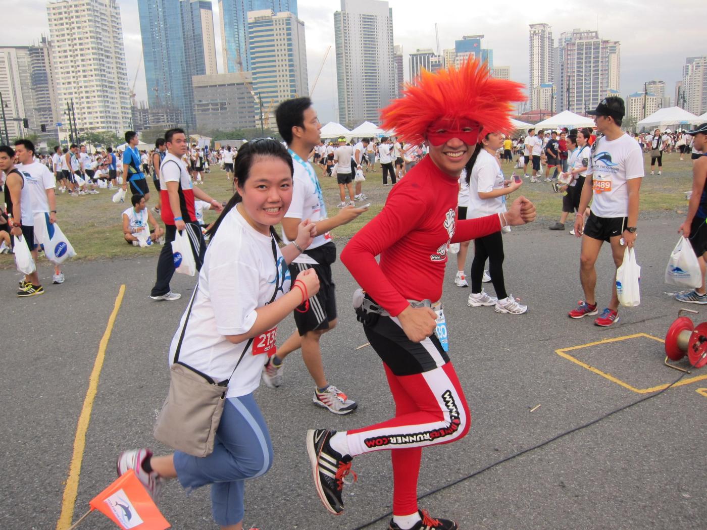 With the runner mascot
