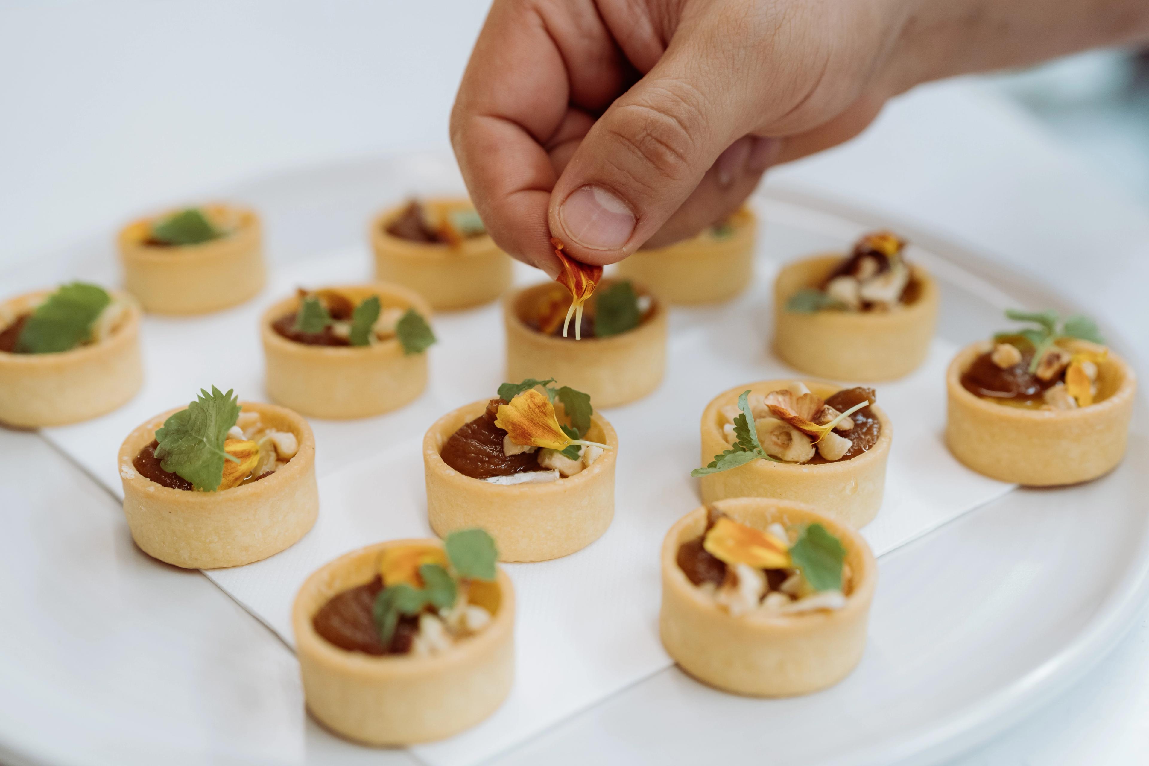 Catered canapés being garnished for the Industry Beans Newstead brand activation in Brisbane.