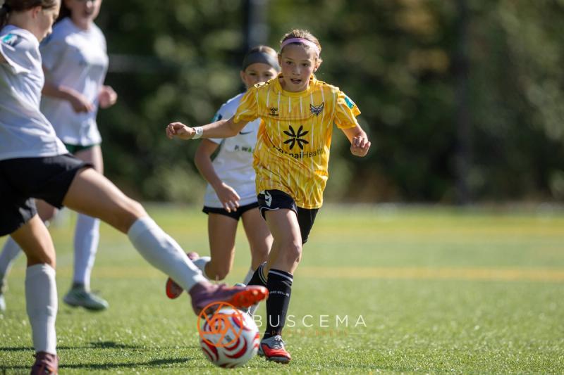 Sting 13G Academy player stepping in to win the ball