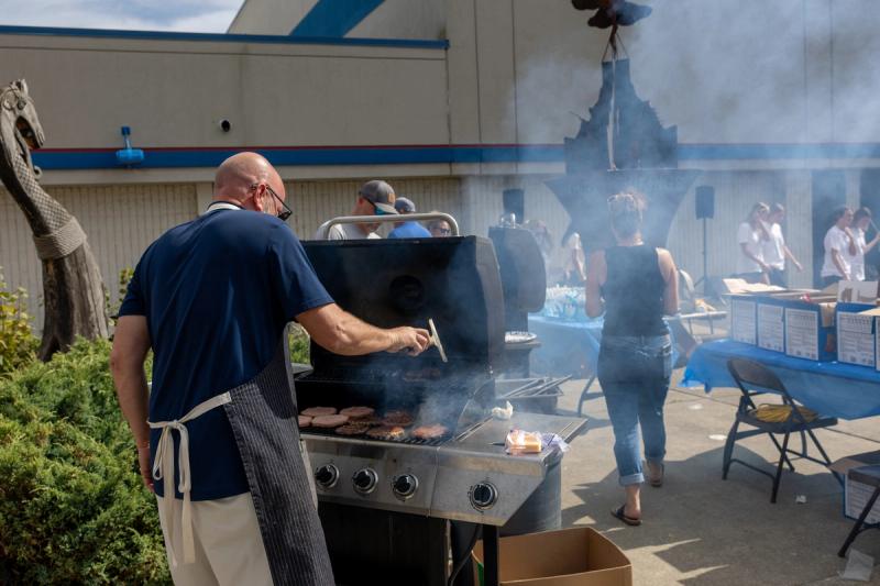 Burgers on the grill at the Coeur d'Alene High School senior kickoff barbecue