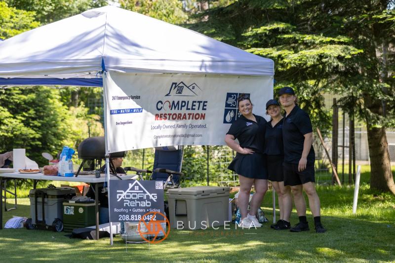 Complete Restoration and Roofing Rehab sponsor tent on the course