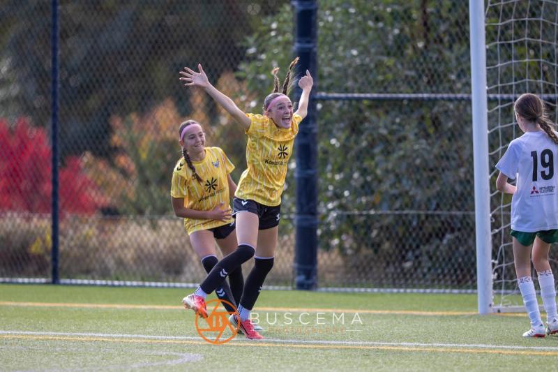 Sting 13G Academy player jumping with her arms up after a goal
