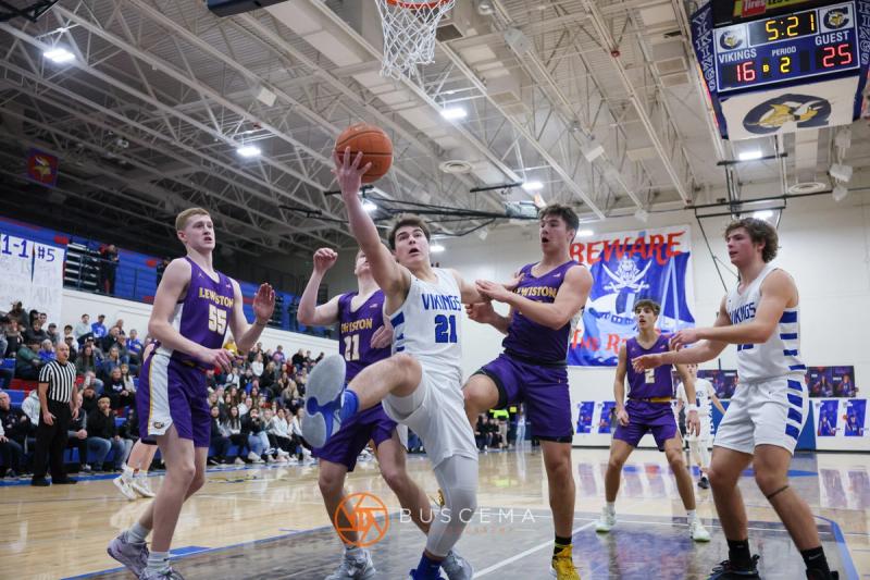 Lewiston @ Coeur d'Alene Boy's Varsity Basketball photo 8