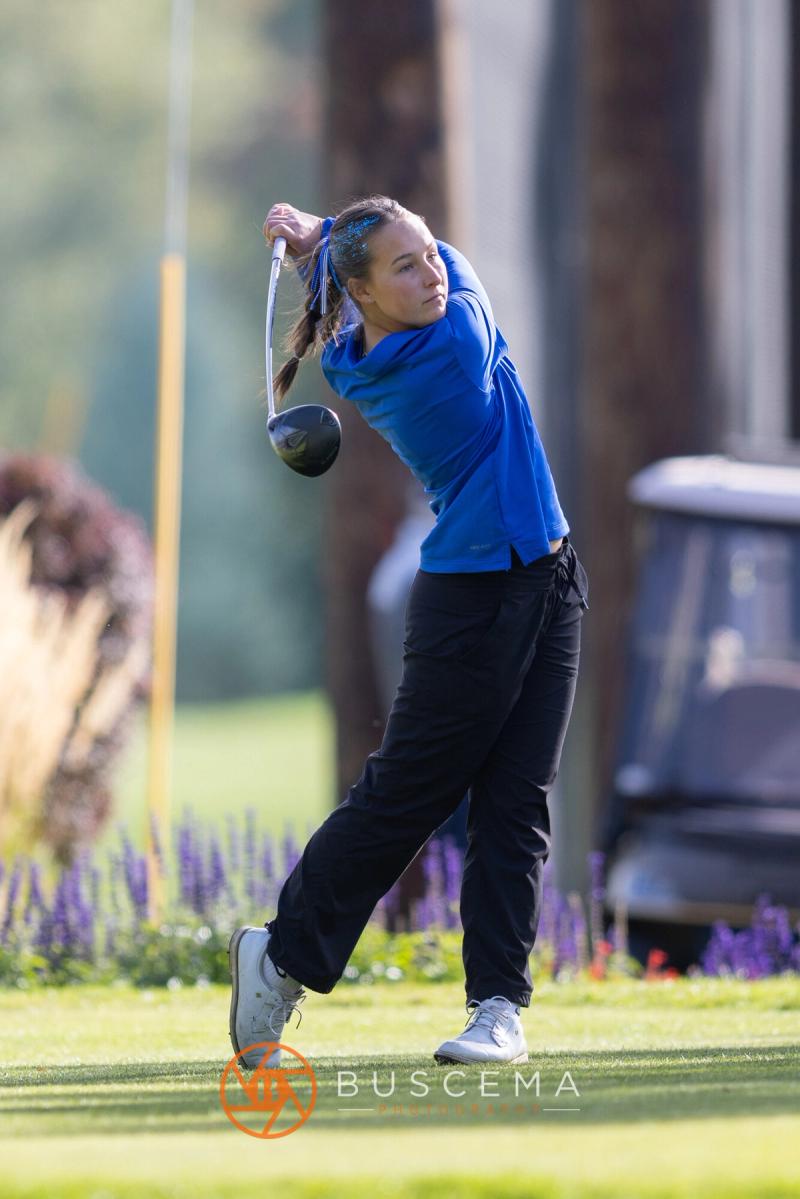 Coeur d'Alene girls golfer driving off the tee at the 6A state golf championships at Avondale Golf Club