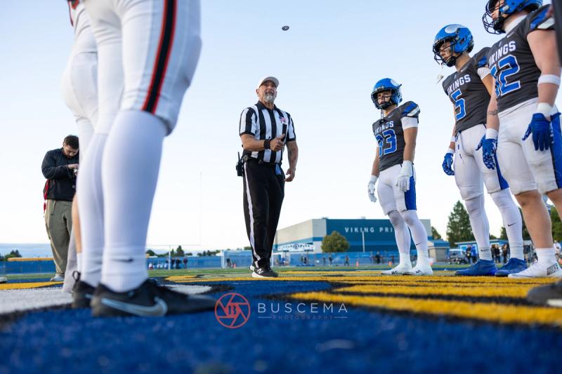 The coin in the air at midfield for the Coeur d'Alene and Lewis and Clark coin toss