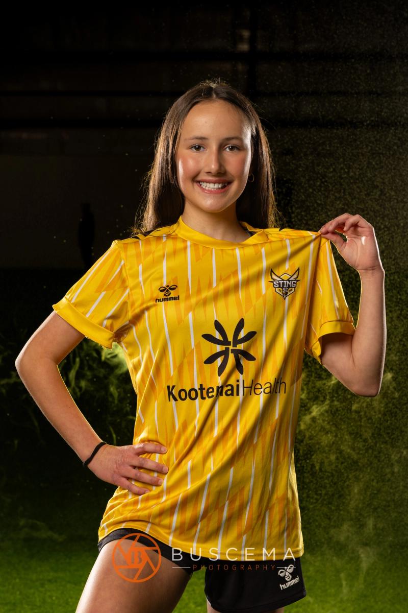 Sting 13G Academy player showing off her jersey