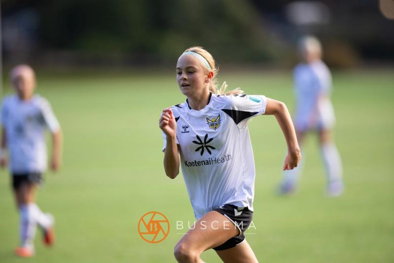 Sting 13G Academy player sprinting into the play