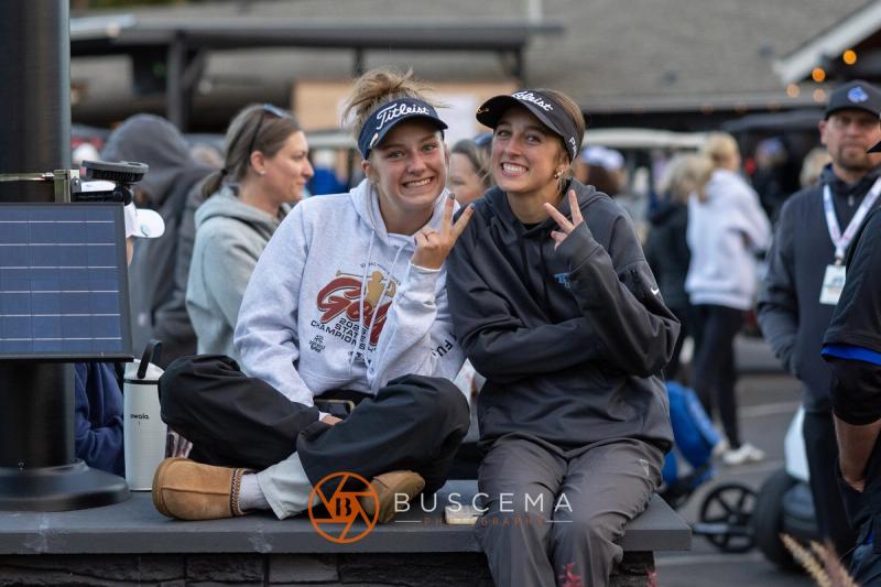 Smiling girls golfers in championship hoodies waiting on the results at the 6A state golf championships at Avondale Golf Club