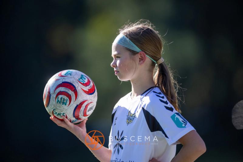 Sting 13G Academy player holding the ball for a throw in