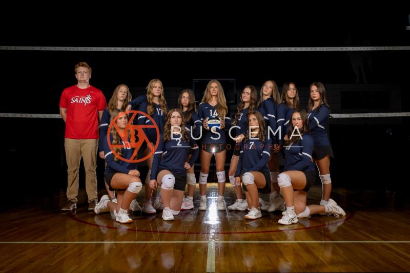 Coeur du Christ Academy volleyball team photo with coaching staff, 2026 season