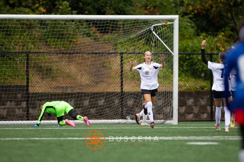 Sting 13-14G Academy player reacting as the Sound FC keeper goes to ground