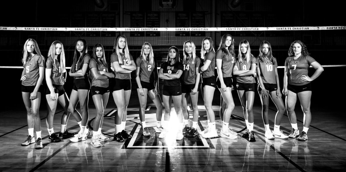 Santa Fe Christian High School volleyball team portrait on court in black and white.