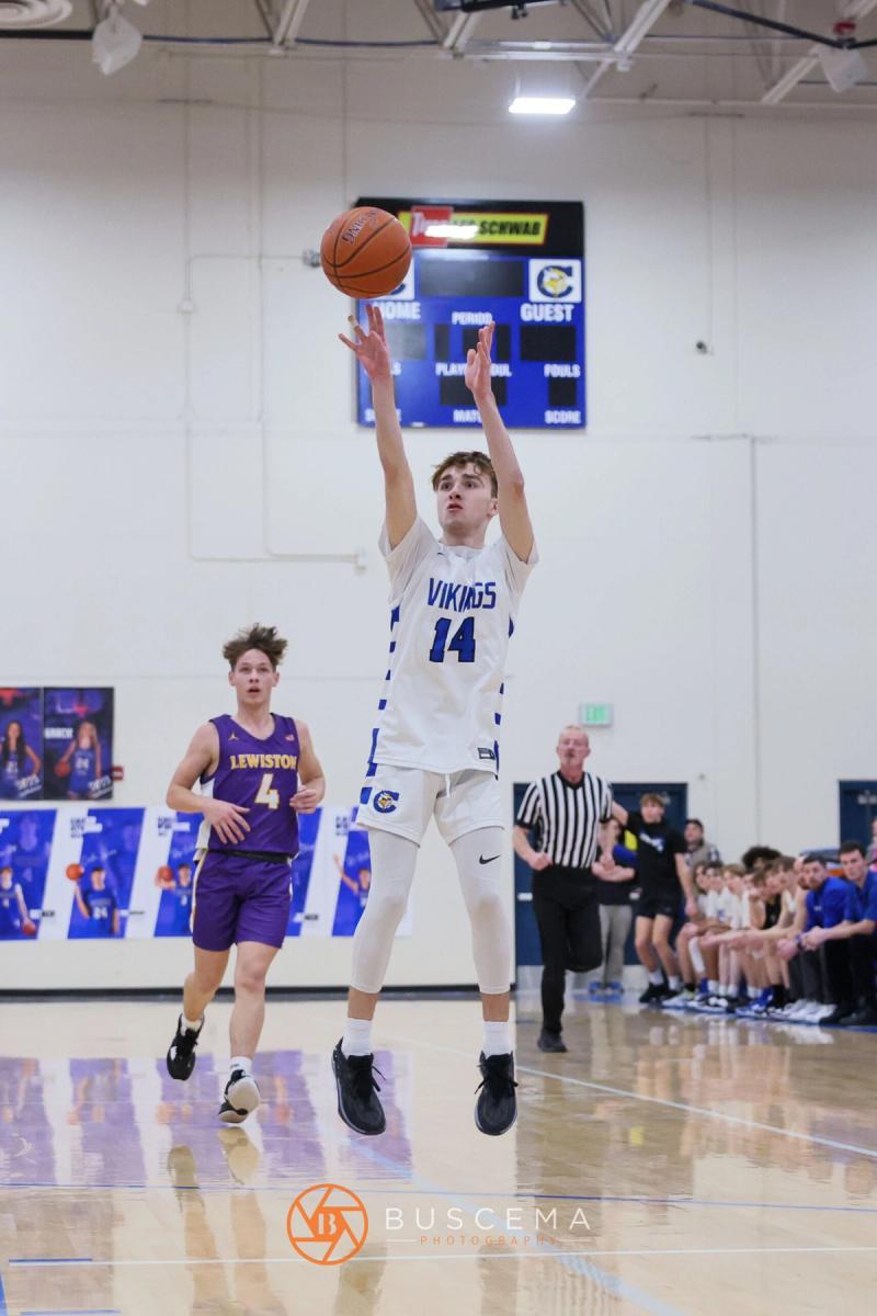 Lewiston @ Coeur d'Alene Boy's Varsity Basketball photo 5