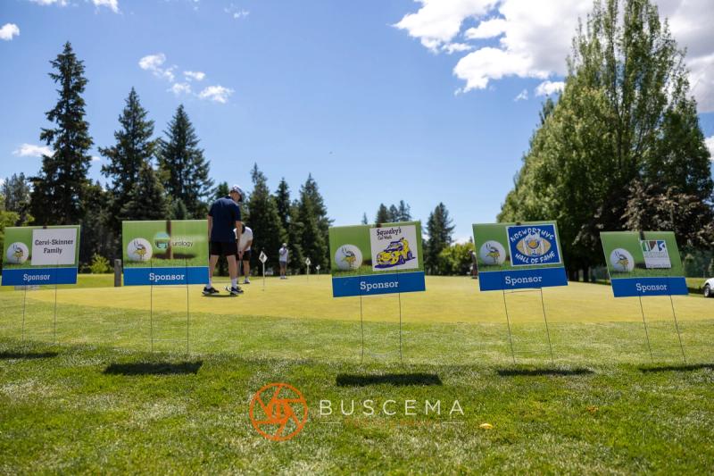 Row of hole sponsor signs along the Avondale fairway