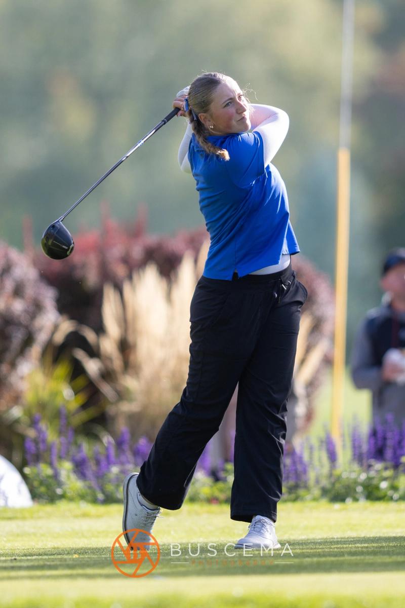 Coeur d'Alene girls golfer finishing her tee shot at the 6A state golf championships at Avondale Golf Club