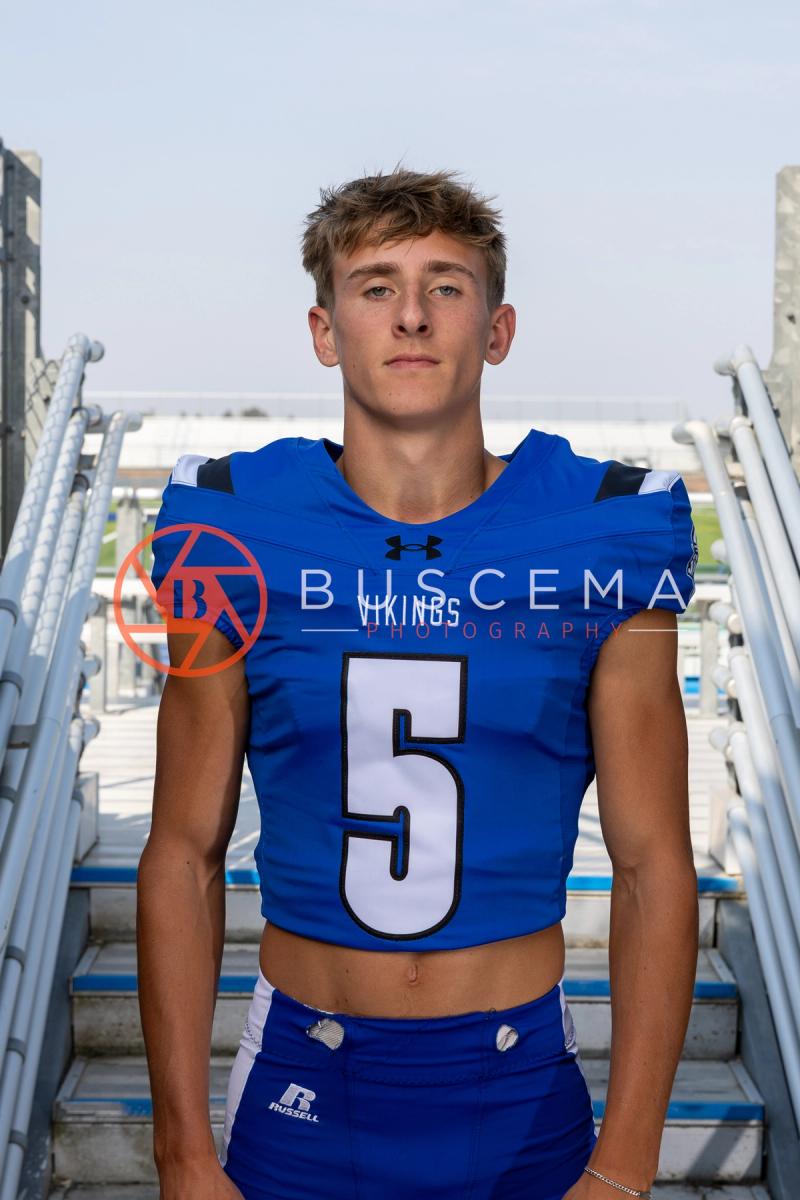 Coeur d'Alene Vikings football player in a number 5 jersey at Coeur d'Alene High School