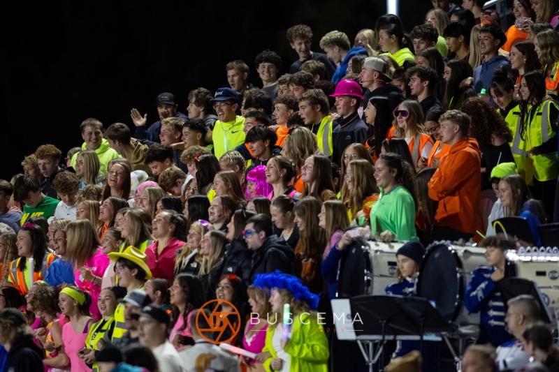 The Coeur d'Alene student section packed and in neon for the Rigby game