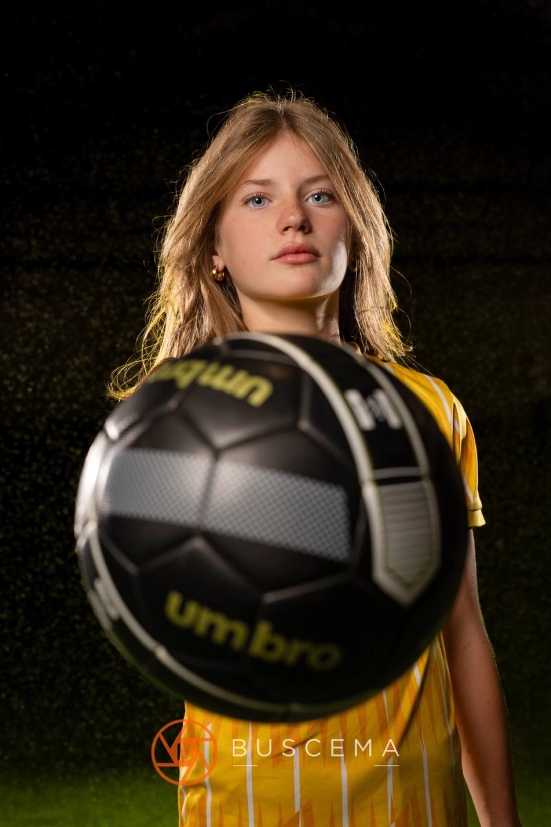Sting 13G Academy player tossing a soccer ball toward the camera