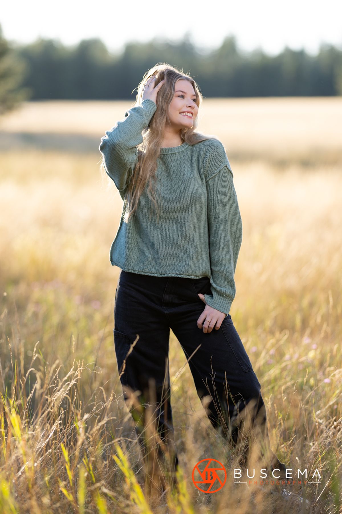 High school senior girl in an open field. Coeur d'Alene Senior Portraits. By Jason Buscema, Coeur d'Alene, Idaho Senior Photographer.