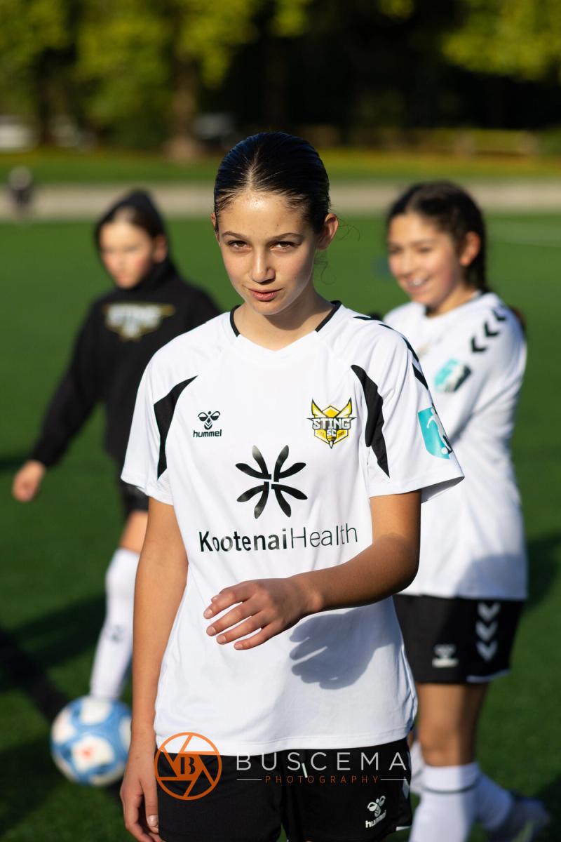 Two Sting 13G Academy players smiling together before the game