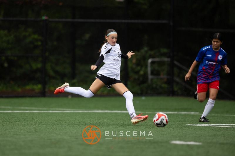 Sting 13-14G Academy player striking the ball at full stretch