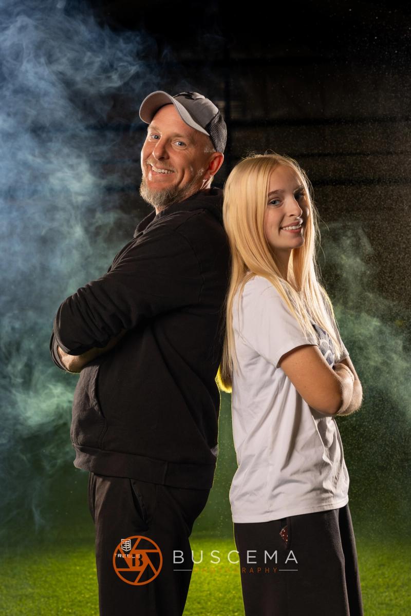 Sting 13G Academy coach and player standing back to back