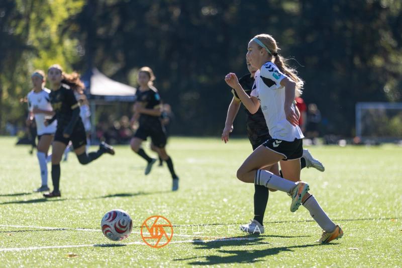 Sting 13G Academy player chasing down the ball