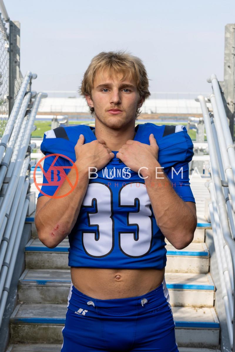 CHS Vikings football player in a number 33 jersey at 2026 team photos