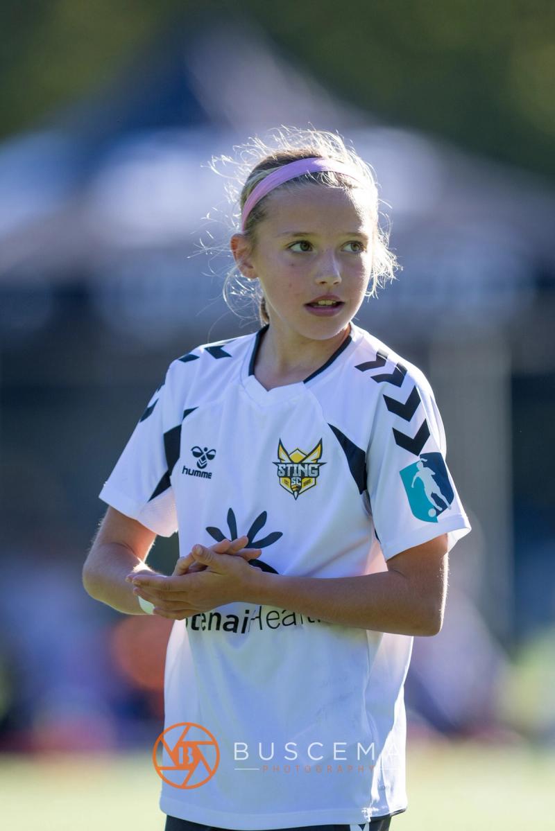 Sting 13G Academy player smiling on the field
