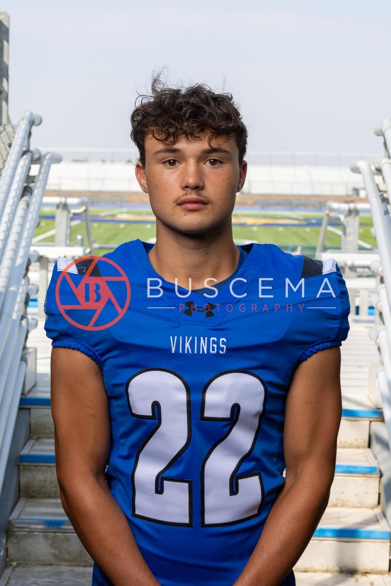 Coeur d'Alene High School football player in a number 22 Vikings jersey