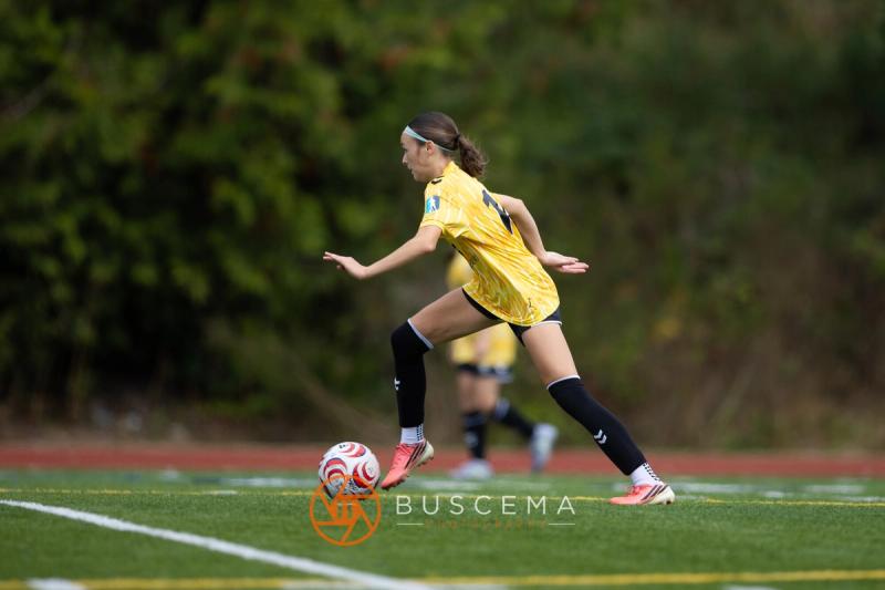 Sting 13-14G Academy player bringing the ball under control