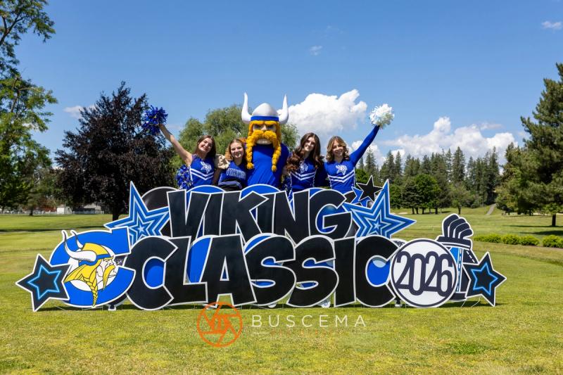 CHS cheerleaders and the Viking mascot cheering behind the Viking Classic 2026 sign on the Avondale course