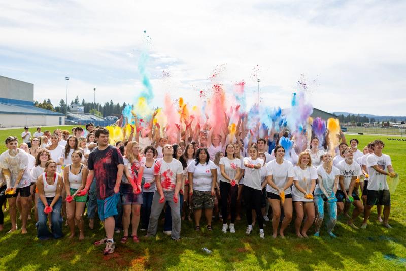 The first burst of colored powder over the Coeur d'Alene senior class