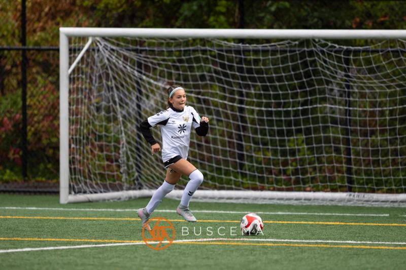 Sting 13-14G Academy player in front of the Sound FC goal