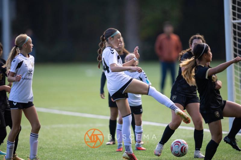 Sting 13G Academy player firing a shot near the goal