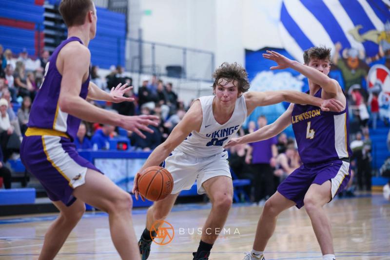 Lewiston @ Coeur d'Alene Boy's Varsity Basketball photo 9