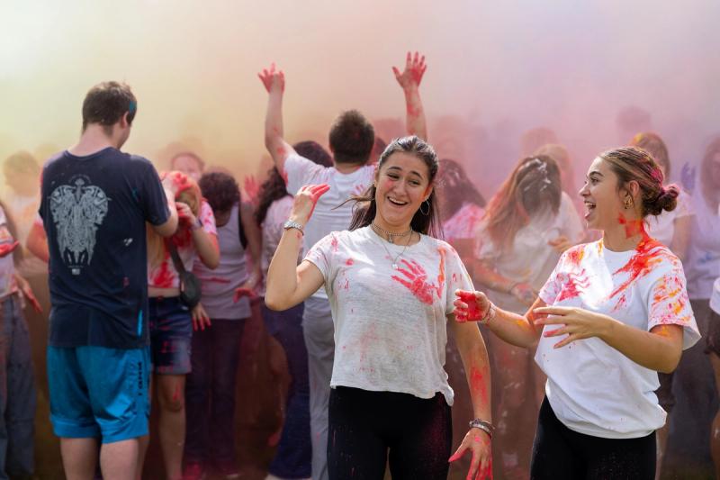 Coeur d'Alene seniors inside the cloud of colored powder