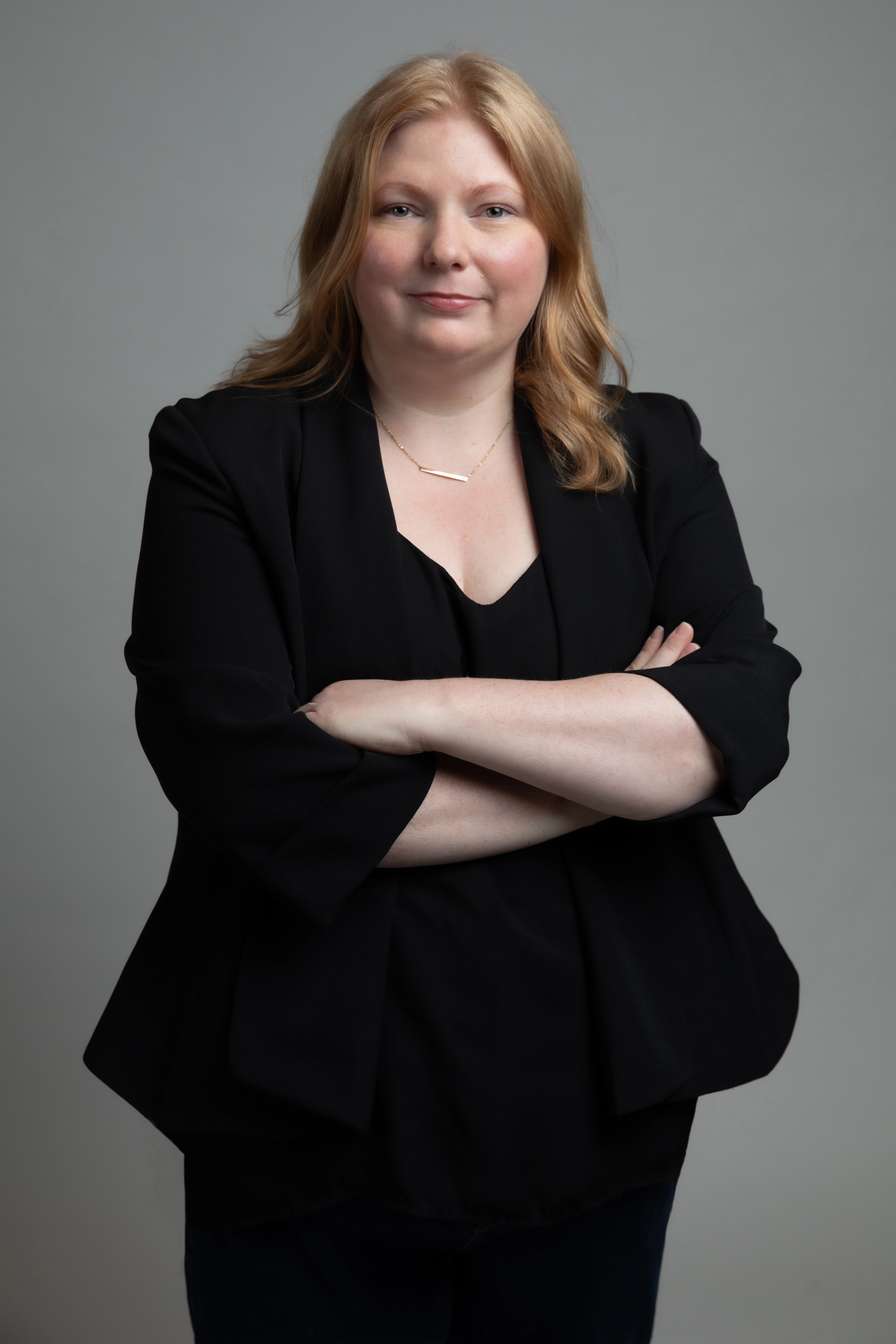 Portrait of Amber Eastman on a gray background