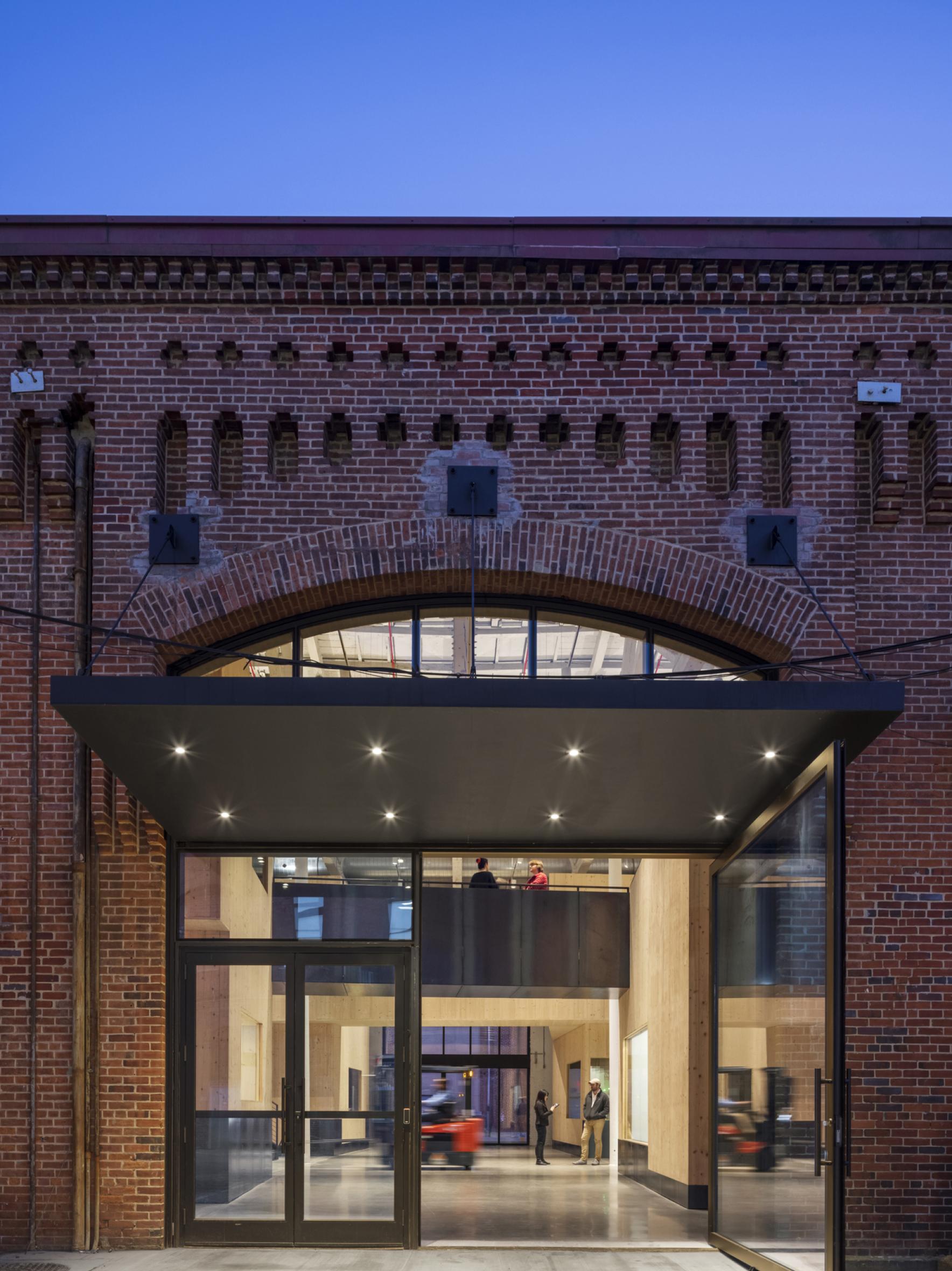 facade of Nanotronics Headquarters at sunset