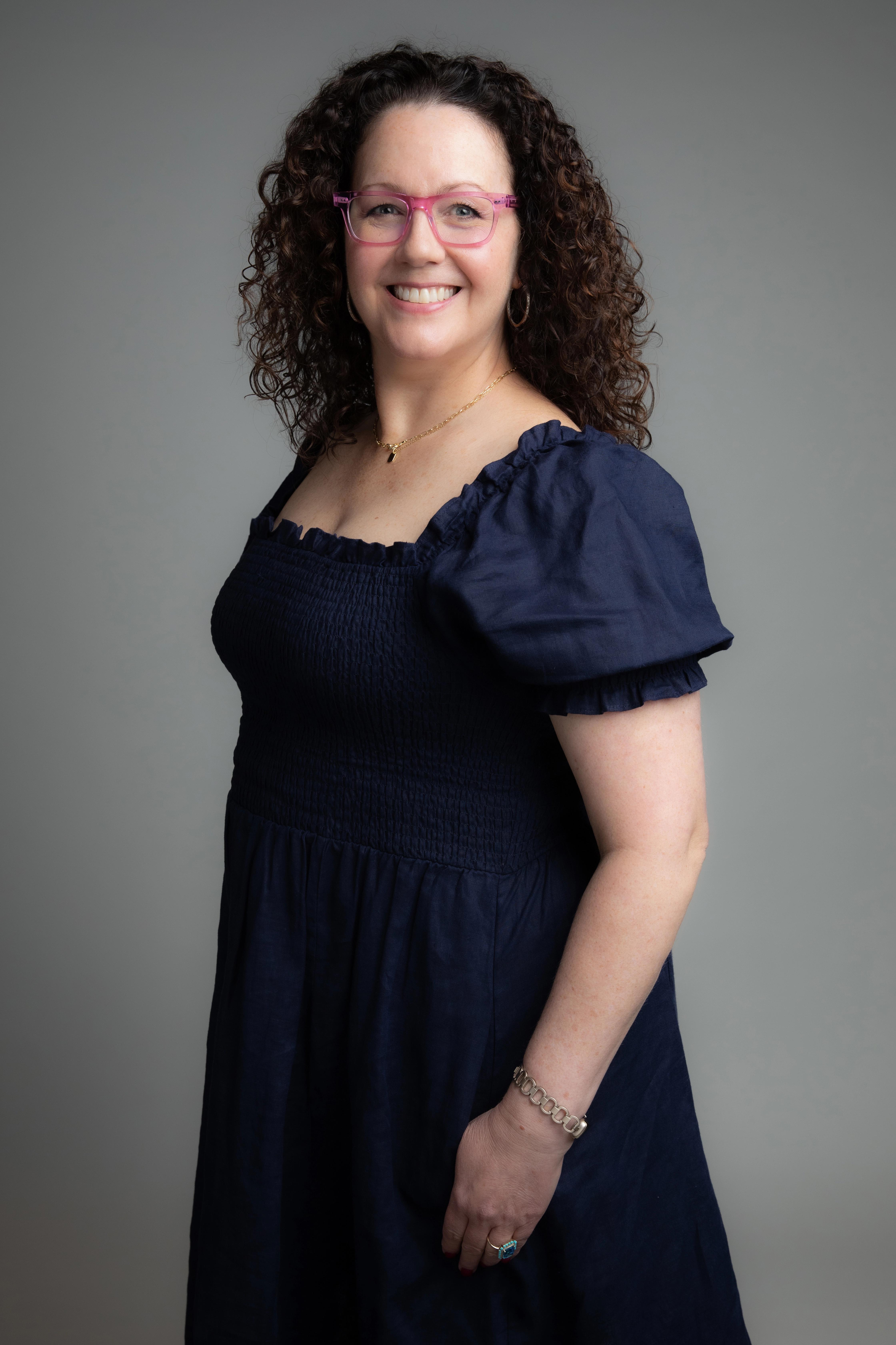 Portrait of Melissa Attebery on a gray background