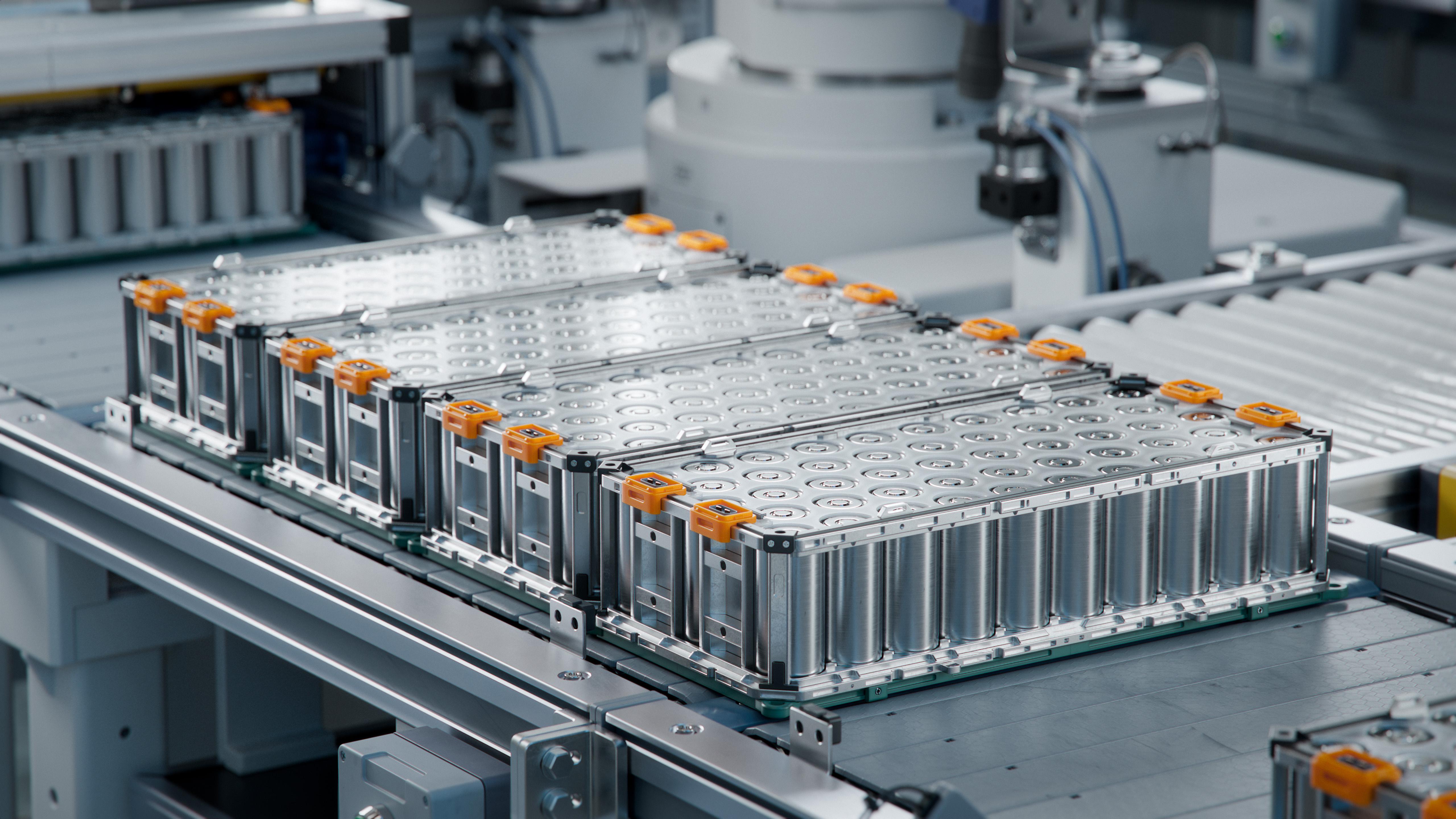 Automotive assembly line with EV battery packs