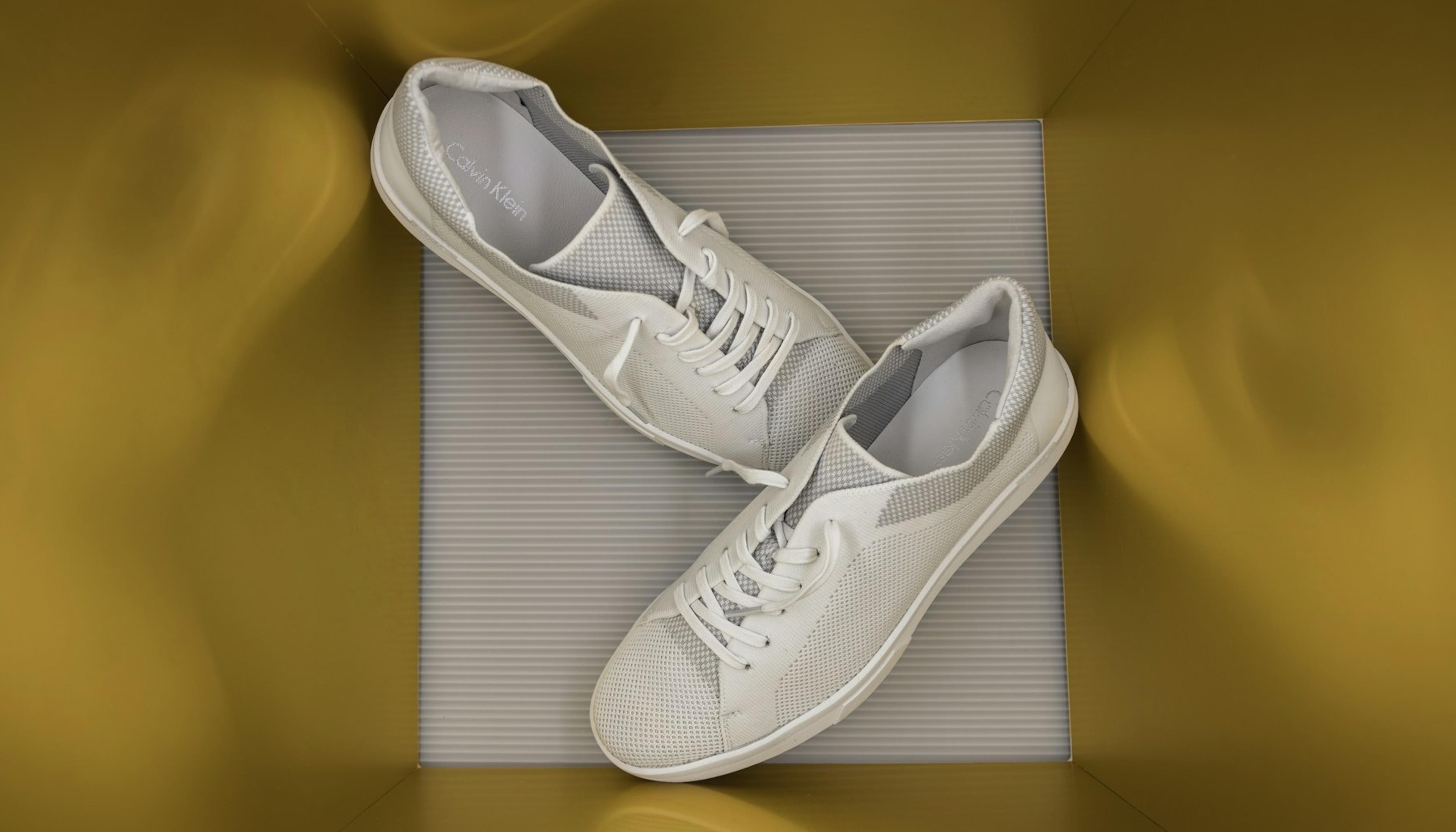 A pair of white sneakers
